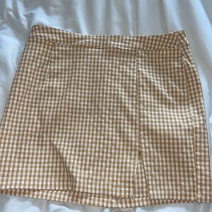 Garage yellow and white plaid skirt.